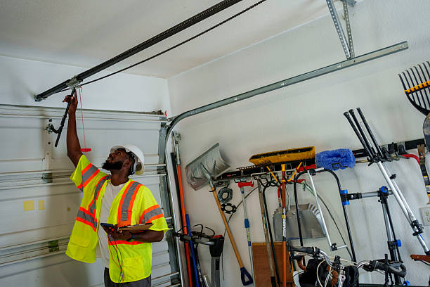 Professional Garage Door Maintenance technician working in O'Fallon, MO